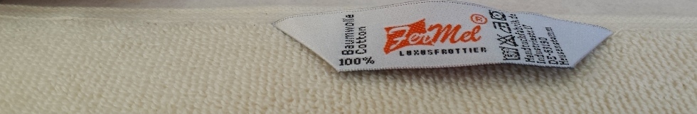 ungefärbte Handtücher eingewebt mit Firmenlogo